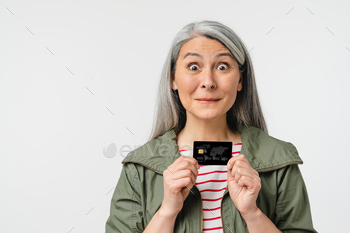  middle-aged woman client customer grandmother dreaming immagines online shopping, buying goods, mortgage loan, e-commerce, pension in white