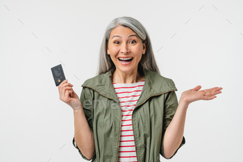 grandmother holding credit card, buying new house, car, mortgage loan, e-commerce, e-banking isolated in white background