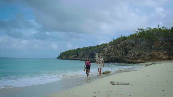 Couple Men and Woman Mid Age on the Beach of Curacao Grote Knip Beach Curacao Dutch Antilles