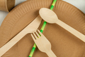 Top view close up wooden utensils and green straw. - PhotoDune Item for Sale