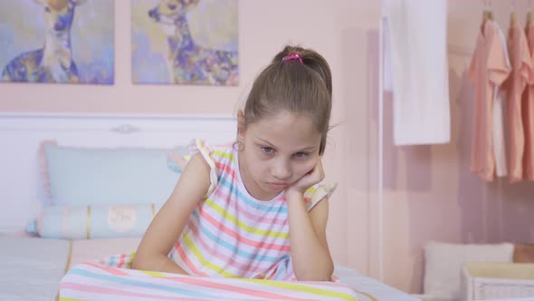 Unhappy girl child. alt