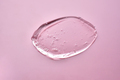 The texture of the cosmetic gel on a pink background. - PhotoDune Item for Sale