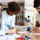 Mother and Father Drawing Together with Their Child - VideoHive Item for Sale