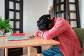 Tired African guy freelancer sleeping at workplace, feeling unmotivated while working from home, - PhotoDune Item for Sale