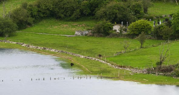 Time Lapse of nature landscape of hills and lake on a cloudy day in Ireland.