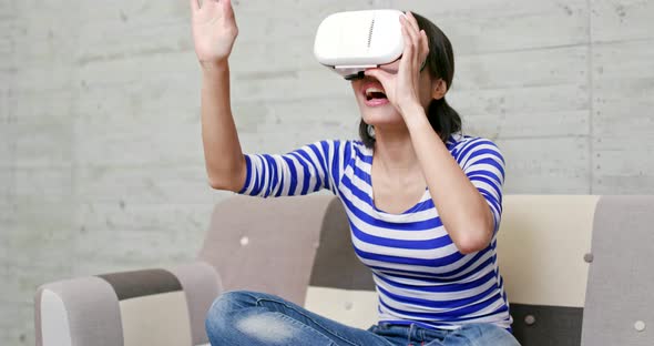 Woman enjoy look at VR device