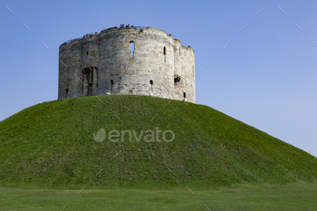 stle in the city of York, England. It is commonly referred to as Clifford’s Tower.