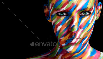 Prettier than any painting. Cropped portrait of a young woman posing with paint on her face.