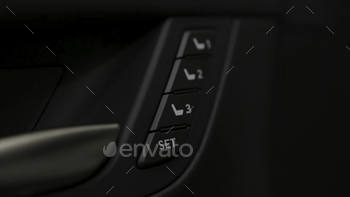 ury car interior. Car salon details, small black buttons of a vehicle.
