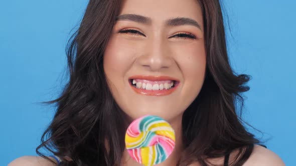 Beautiful woman with candy sweet