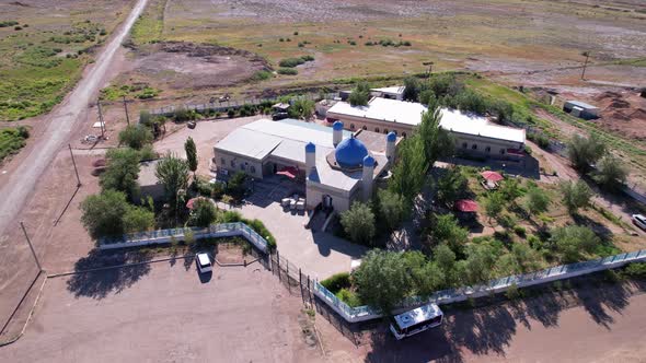 A Small Mosque Stands on the Outskirts of the City