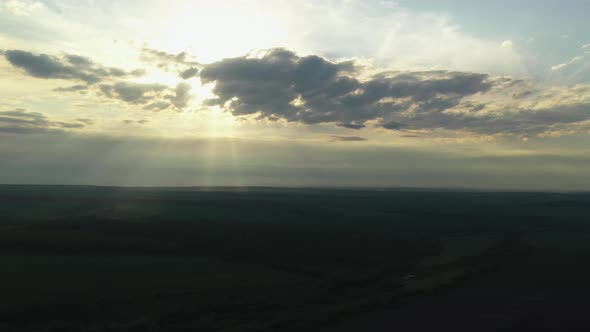 Sun Rays Through the Cloudy Sky Just Before Sunset