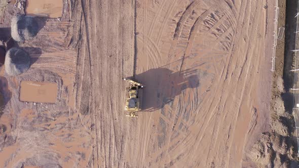 Bulldozer Using GPS Technology to Move Earth during Groundworks