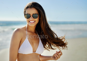 ful young woman spending some time at the beach