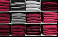 Multo color winter sweater on store shelves. New 2023 trending PANTONE 18-1750 Viva Magenta colour - PhotoDune Item for Sale