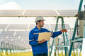 Engineer working for alternative energy Solar farm - PhotoDune Item for Sale