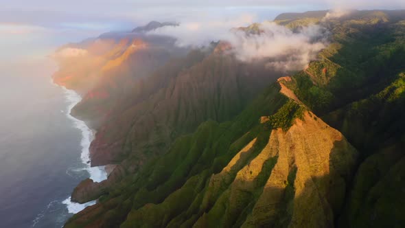 Peaceful Hawaiian Coastline Panorama Under Dramatic Sunset Light. Aerial Footage