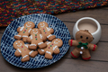 Christmas gingerbread man cookies on a blue plate - PhotoDune Item for Sale
