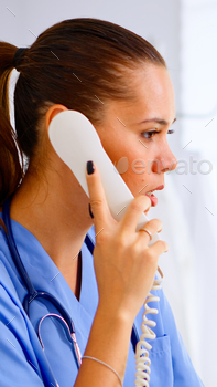 g telehealth communication in hospital. Healthcare physician in medicine uniform, receptionist doctor assistant helping with phone concultation