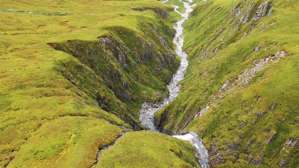 Aerial view of a waterfall in Anderson Bay, Unalaska, Alaska, United States.