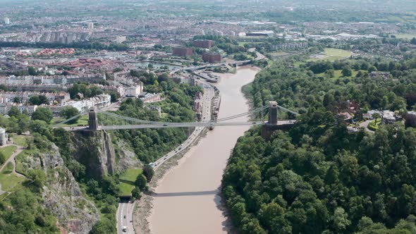 Cinematic Dolly forward pan down drone shot over Clifton Suspension bridge Bristol