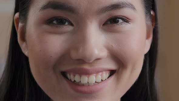 Close Up Headshot Female Portrait 25s Asian Ethnicity Woman Smiling Wide Toothy Look at Camera