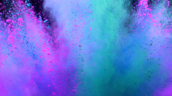 Super Slowmotion Shot of Color Powder Explosion Isolated on Black Background