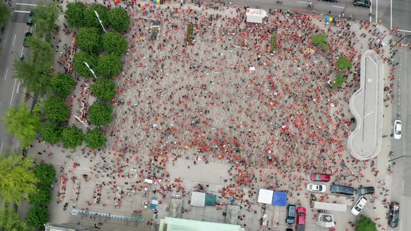 Cinematic Overhead Drone View of Protesters in Downtown Vancouver, Sinking Aerial Shot. Big Crowd of