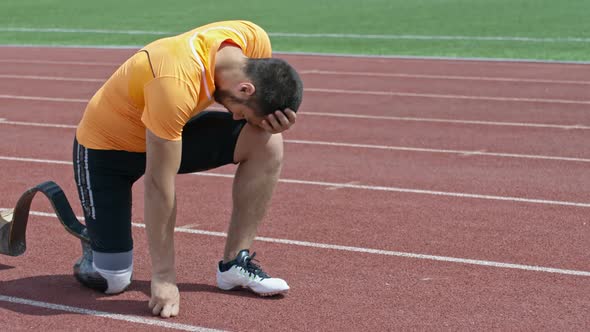 Strong Amputee Athlete Continuing Training while Suffering from Pain