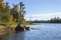 Northern Minneosta lakeshore with trees and rocks during autumn - PhotoDune Item for Sale