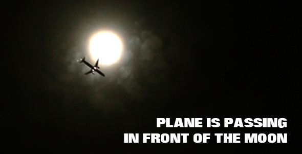 Plane Is Passing In Front Of The Moon
