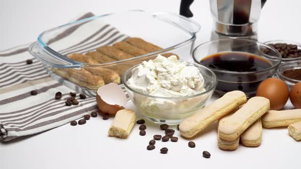 Ingredients for Making Traditional Italian Cake Tiramisu on White Background