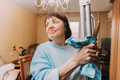 Happy Shy Mature Woman Cleaning Apartment. Concept Of Household And People In Retirement. Elderly - PhotoDune Item for Sale