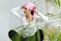 Woman with cancer wearing a pink scarf - PhotoDune Item for Sale