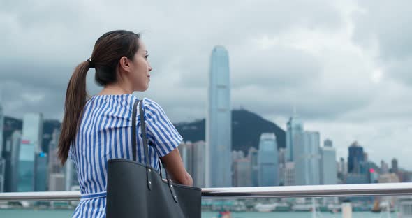 Woman look at view in Hong Kong