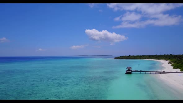 Aerial top down texture of tropical lagoon beach break by aqua blue lagoon with white sandy backgrou