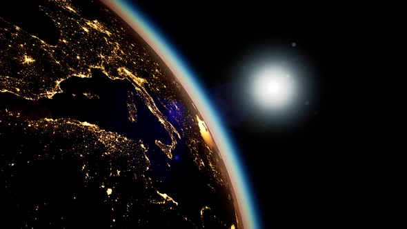 Space, Sun and Planet Earth at Night alt