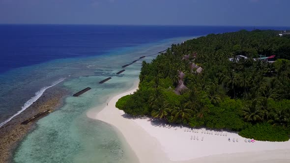 Aerial drone abstract of island beach by blue ocean and sand background