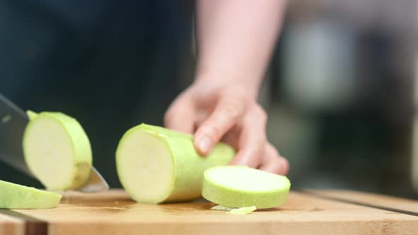 Professional Cook Woman Hands Slicing Fresh Zucchini