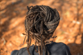 Rear view of person with locs wrapped shot from behind - PhotoDune Item for Sale