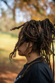 Woman with locs wrapped shot from the side - PhotoDune Item for Sale