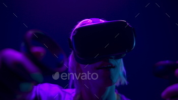 VR headset man playing 3D videogame closeup. Metaverse technology concept