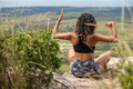 Woman seen practicing yoga on cliff - PhotoDune Item for Sale