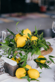 Festive table decorated with lemon arrangements - PhotoDune Item for Sale