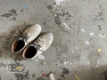 Shoes covered in paint on the grey background - PhotoDune Item for Sale