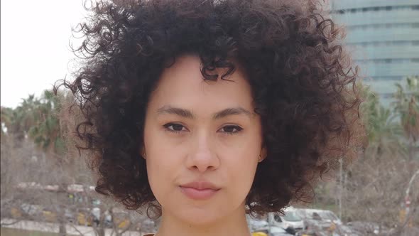 Portrait of a Young African American Woman Looking at Camera