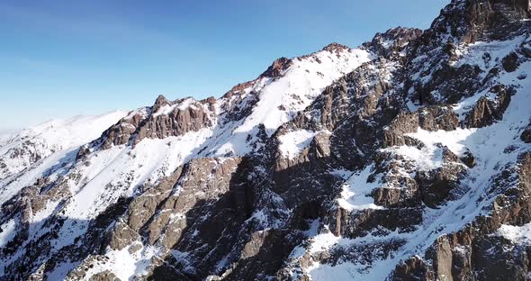 Huge Rocks Covered with Snow