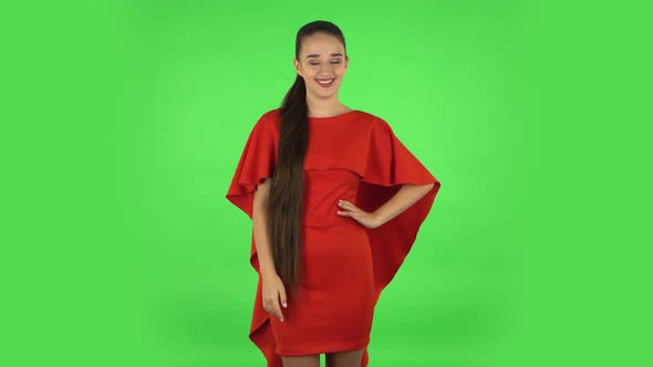 Pretty Young Woman Is Proud of Himself. Green Screen