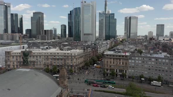 AERIAL: Forward Flight Over Frankfurt Am Main, Germany Central Train Station with Skyline View and