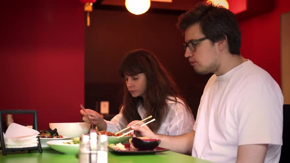 Close Up of European Couple in Asian Restaurant